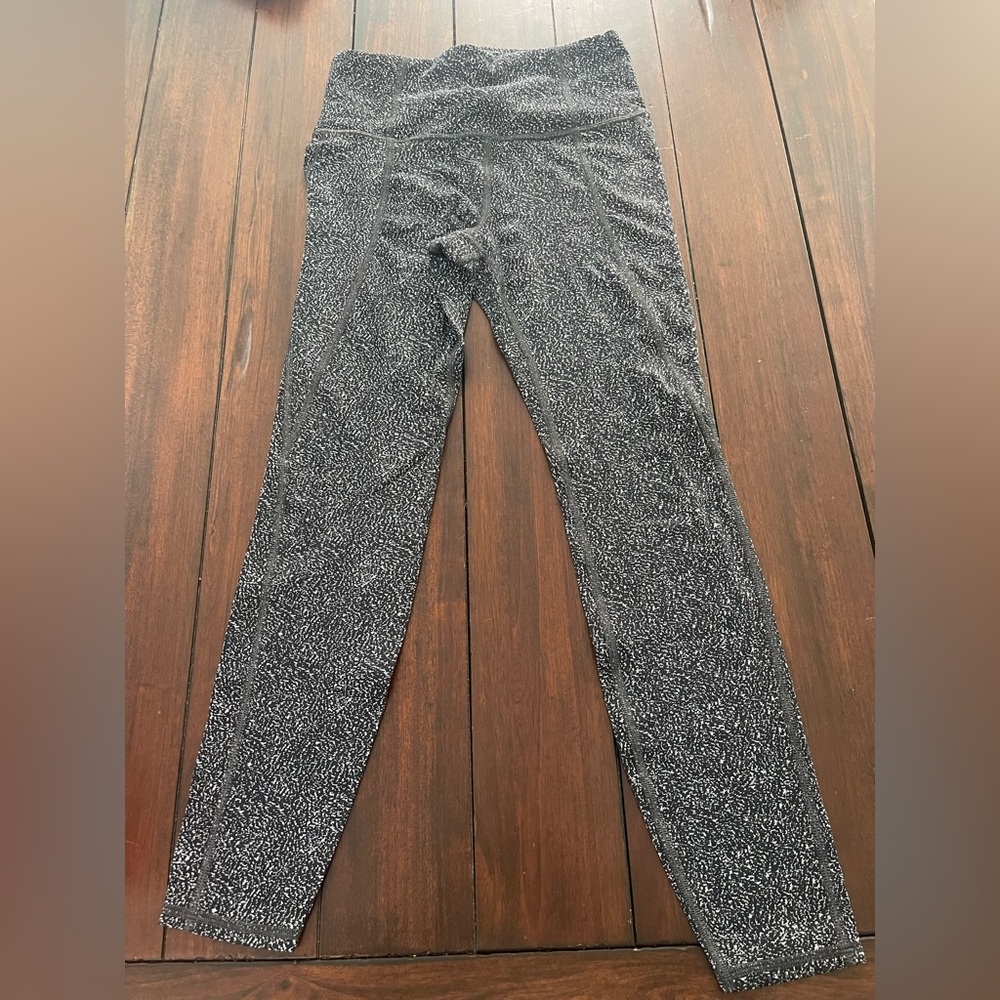 athleta salutation stash pocket lightning static 7/8 tight